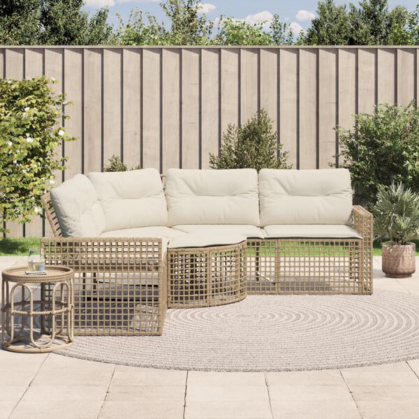 Salon de jardin d'angle résine tressée beige avec coussins blanc crème dans un jardin
