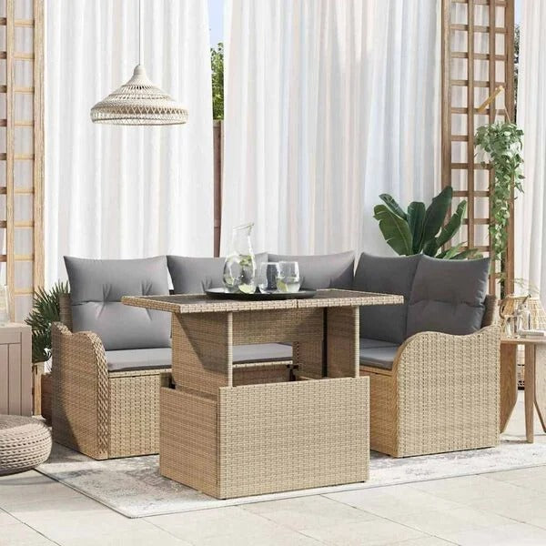 Salon de jardin rotin extérieur avec canapé d'angle et table réglable installé sur une terrasse