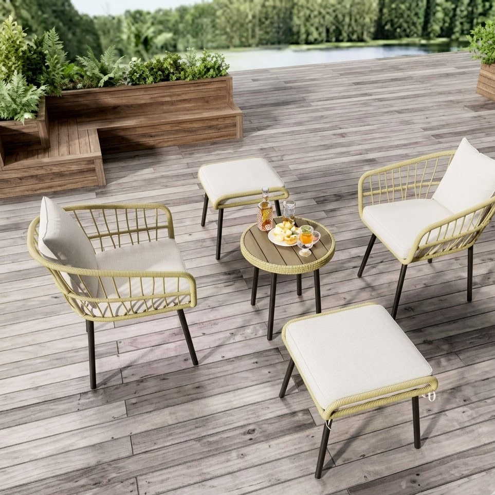 Salon de jardin en rotin naturel 5 pièces installé sur une terrasse en bois, vue de dessus